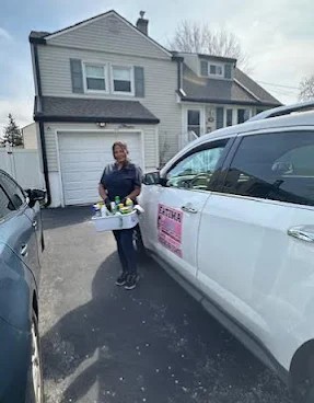 Fatima Cleaning Services team with branded vehicle